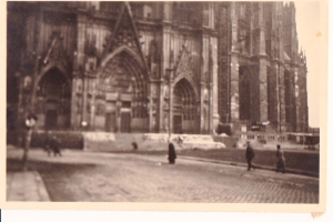 Writing on the back simply says "north view." The people in the picture give some indication of just how big the cathedral was (is). A landmark that large would have helped bomber crews target the city.